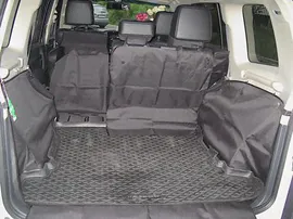 Защитный чехол AUTOSMSTUDIO Maxi в багажник автомобиля для Mitsubishi Pajero IV V90 2006-2024, черный. Артикул TP-PADJERO-IV-MAXI-BL